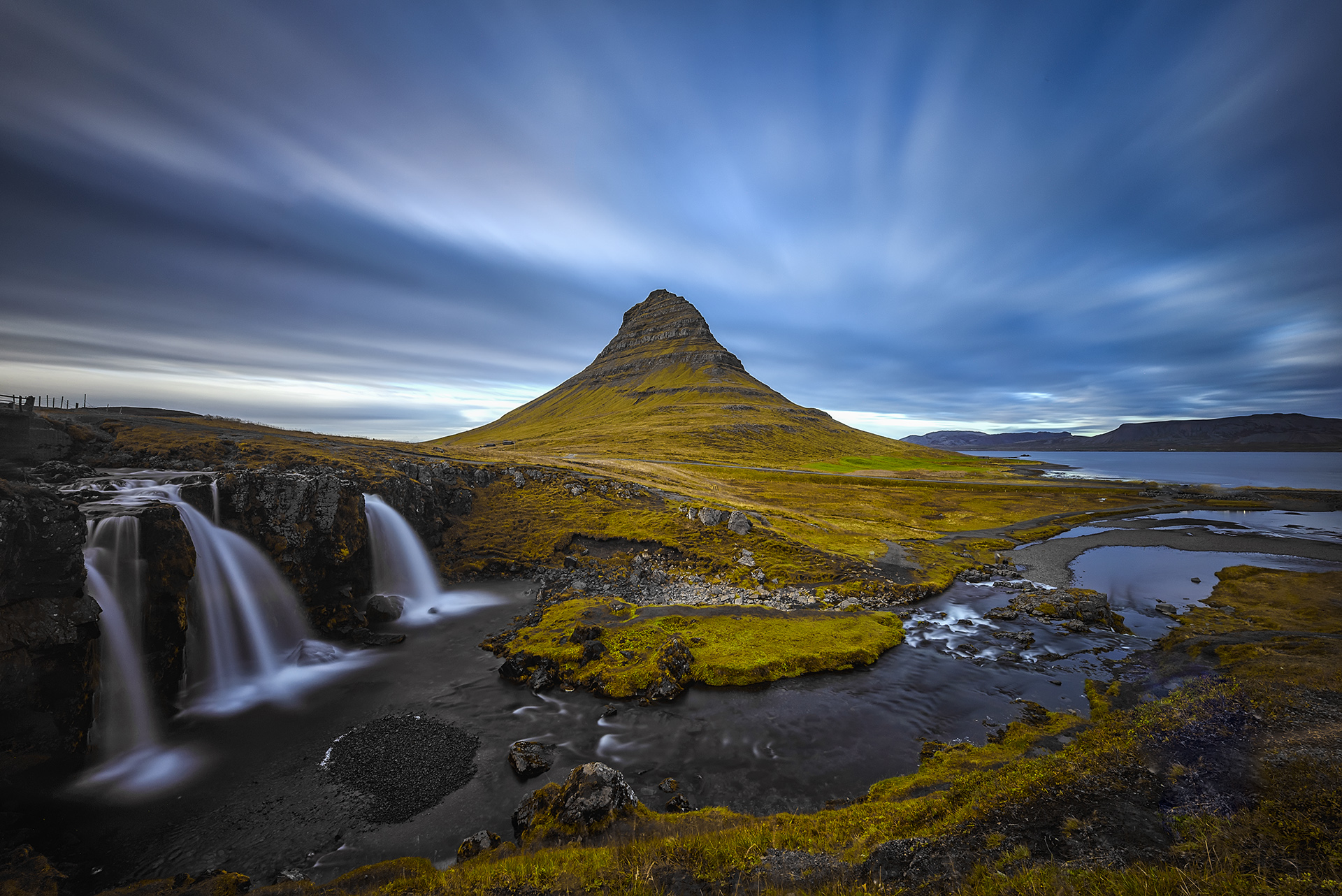 Landscape photography of a dramatic mountain and waterfall scenery